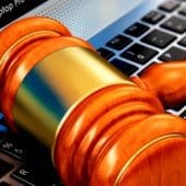 judges hammer on laptop