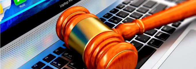 judges hammer on laptop