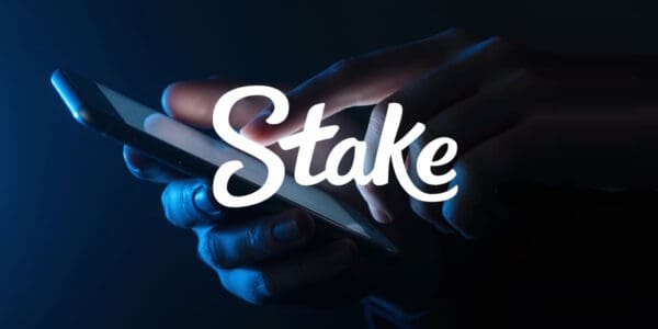 stake logo over a mobile phone being accessed