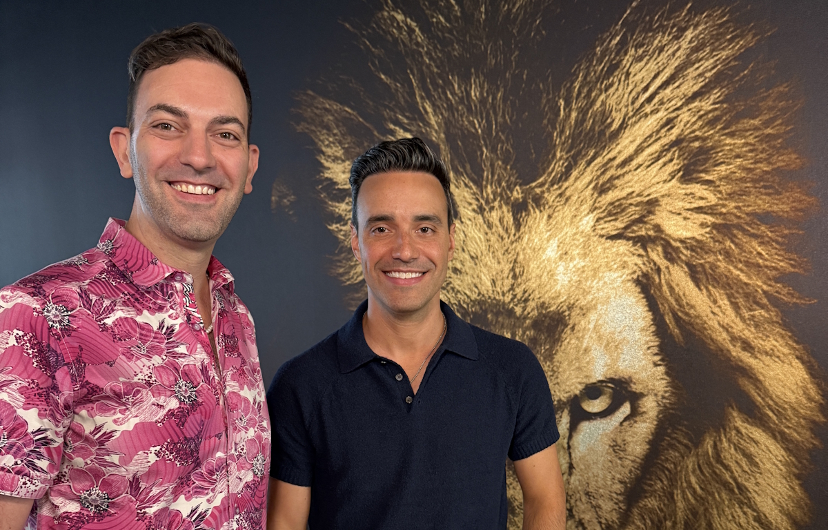 brian christopher and Marco with lion art backdrop