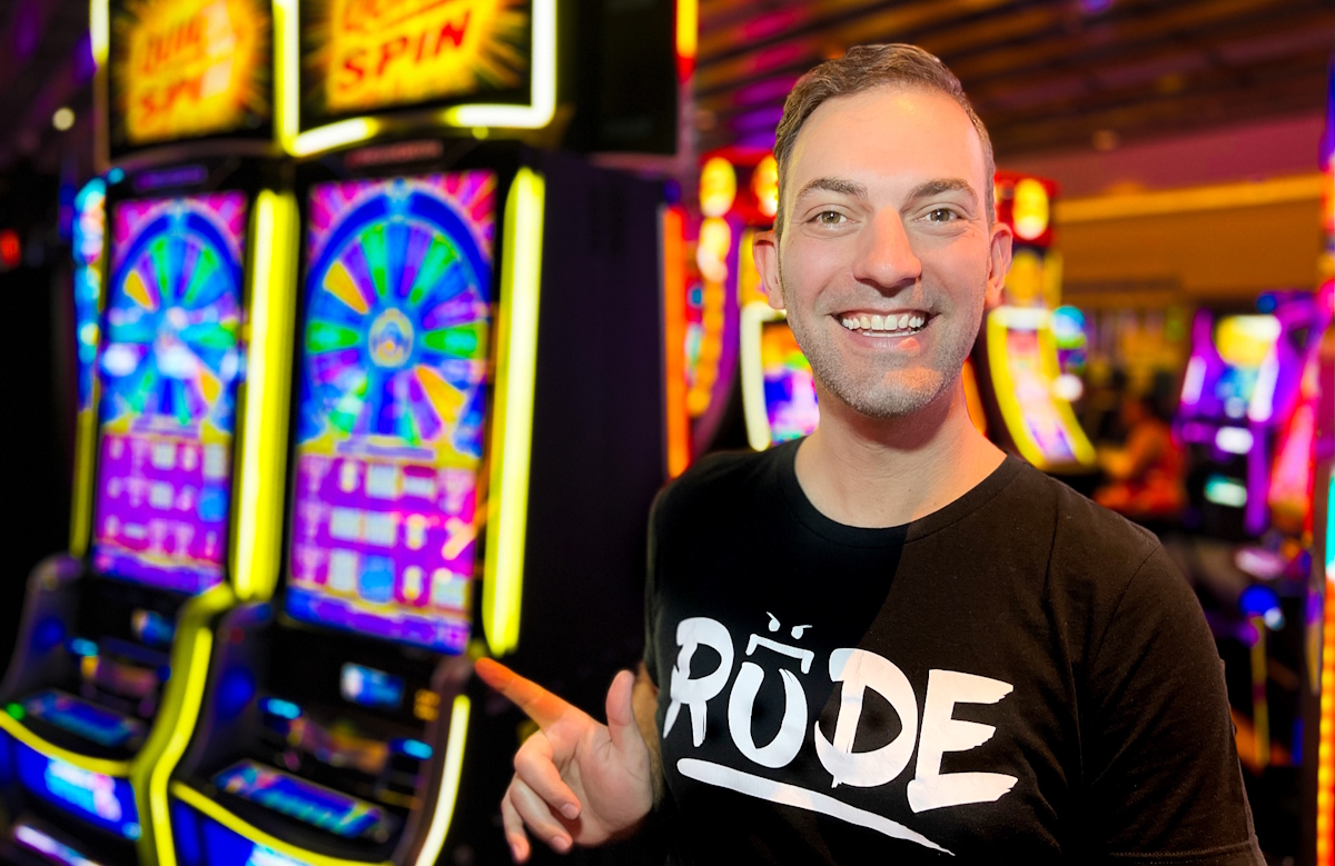 brian christopher rude t-shirt next to slot machine